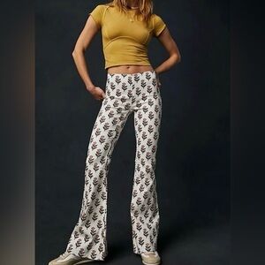 We The Free Penny Pull-On Printed Flare Jeans with a terracotta tulip print
